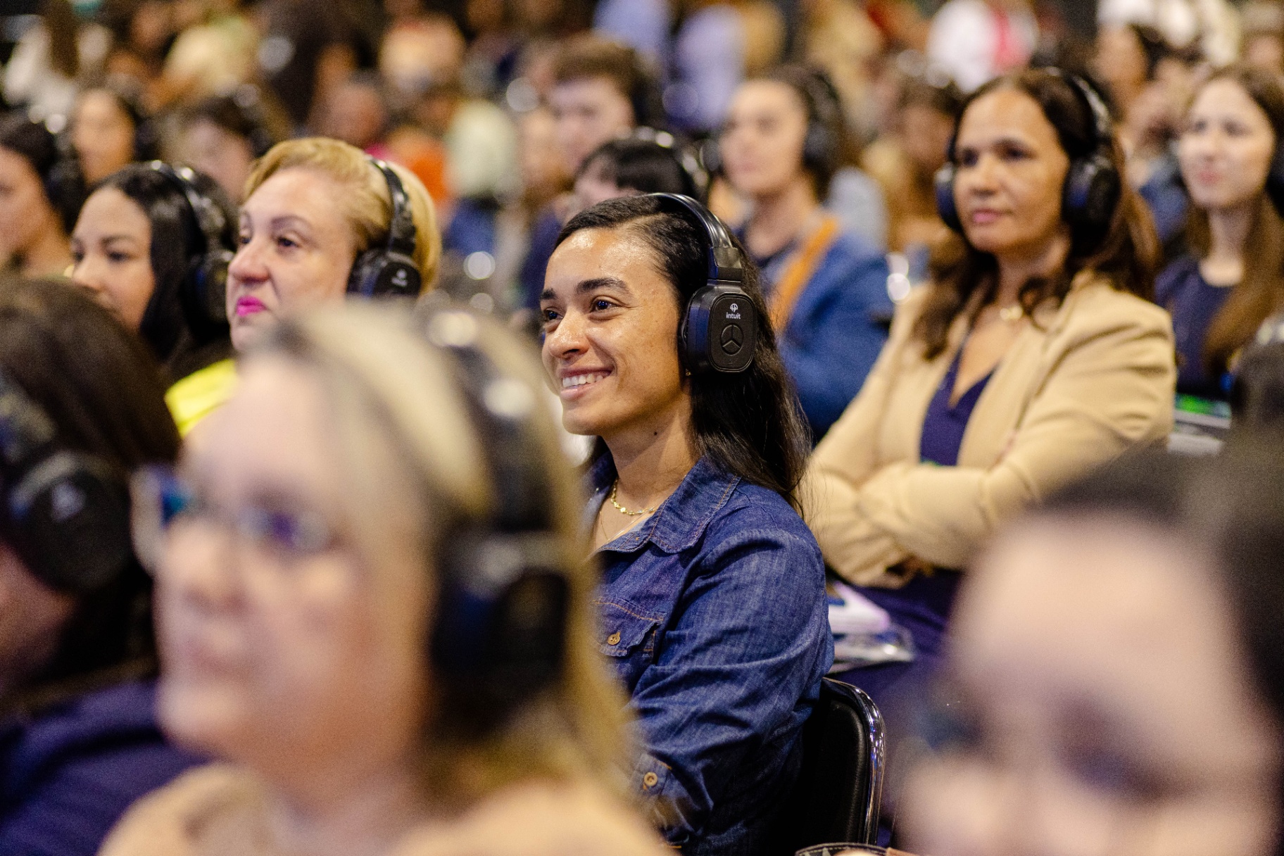 Participante sorrindo durante o Congresso ExpoTEA 2025